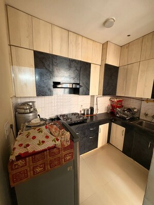 Kitchen in 2 BHK Apartment at Divyansh Flora, Sector 16c Greater Noida – for Rent