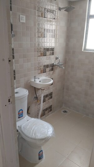 Bathroom in 2 BHK Apartment at Newtech La Palacia, Tech Zone 4 Greater Noida – for Rent