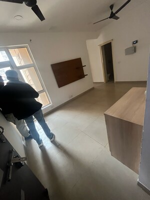 Living Room in 2 BHK Apartment at Gaur City 5th Avenue, Gaur City 1 – for Sale