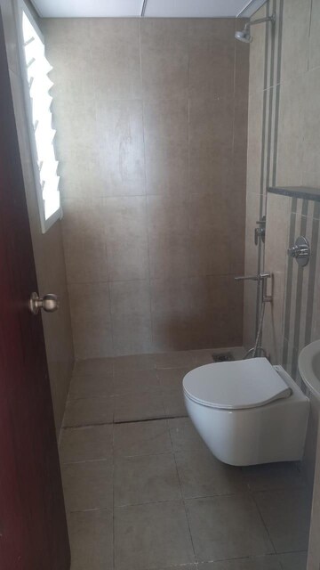 Bathroom in 2 BHK Apartment at Puravankara Silversands, Mundhwa – for Rent