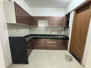 Kitchen in 2 BHK Apartment at Kohinoor Zen Estate, Kharadi – for Rent