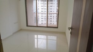 Room in 2 BHK Apartment at Rashi Tower, Goregaon East – for Sale