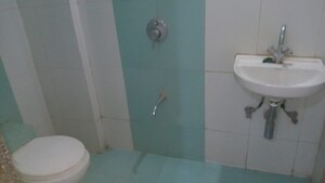 Bathroom in 2 BHK Apartment at Rashi Tower, Goregaon East – for Sale