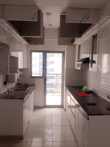 Kitchen in 2 BHK Apartment at Gulshan Bellina, Sector 16 Greater Noida – for Rent