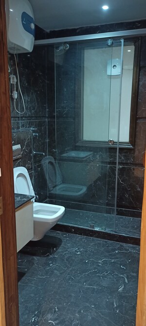 Bathroom in 4 BHK Builder Floor at Ansal Sushant Lok I, Sector 43 – for Rent