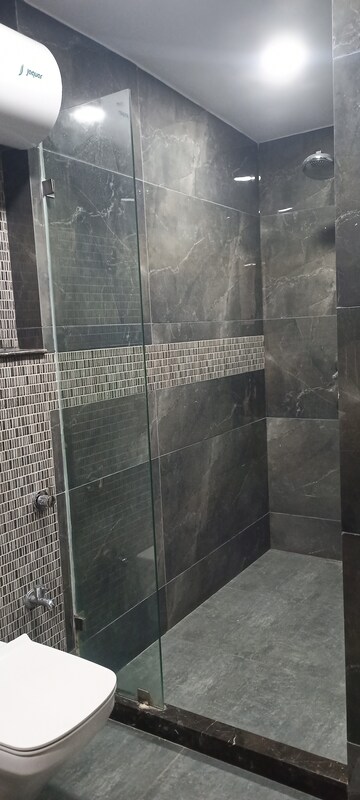 Bathroom in 4 BHK Builder Floor at Ansal Sushant Lok I, Sector 43 – for Rent