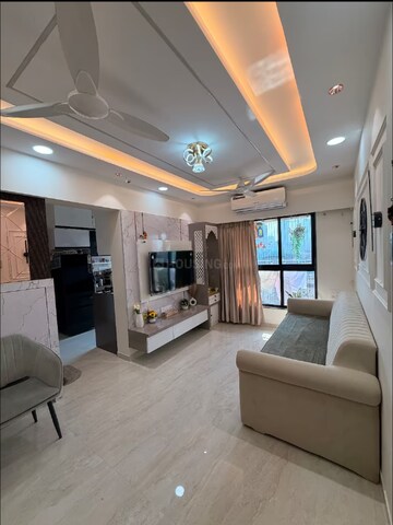 Living Room in 1 BHK Apartment at Chaitanya The Greens Radhakunj, Kandivali East – for Sale