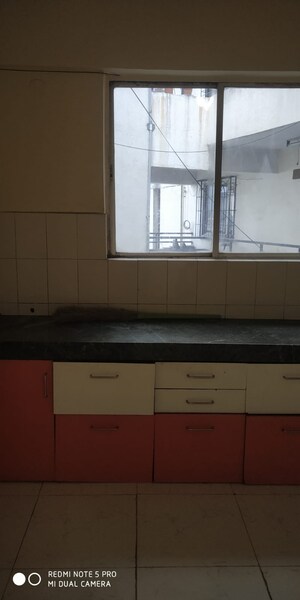 Kitchen in 2 BHK Apartment at Parmar Square, Kharadi – for Rent