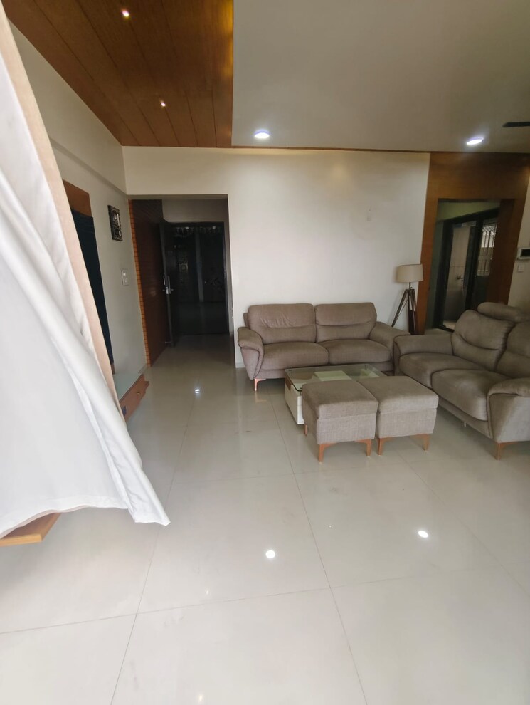 Living Room, pride-purple-park-titanium 3 Bedroom 1470 Sq.Ft. Apartment In Wakad Pune 9668732