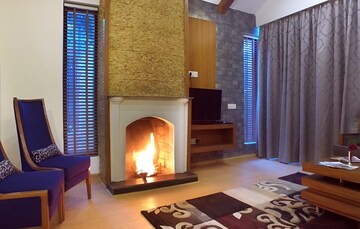 Living Room in 4 BHK Apartment at Ramprastha Attalika, Ramprastha Greens – for Sale