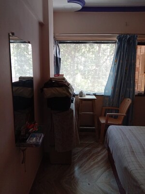 Living Room in 2 BHK Apartment at Chincholi Apartment, Malad West – for Rent