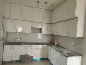 Kitchen in 6 BHK Apartment at Samridhi Luxuriya Avenue, Sector 150 – for Rent