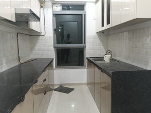 Kitchen in 3.5 BHK Apartment at Kalpataru Immensa B, Kolshet Road – for Rent
