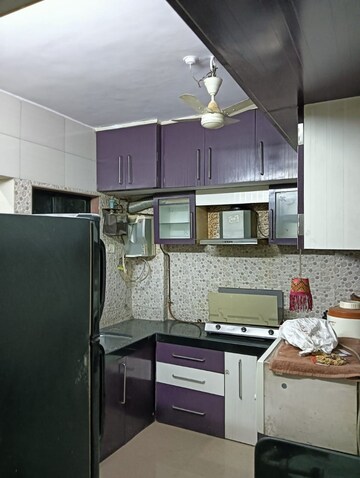Kitchen in 2 BHK Apartment at Arjun CHS Vasant Vihar, Vasant Vihar – for Rent