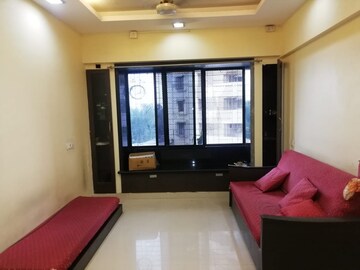 Living Room in 1.5 BHK Apartment at Comet Apartment, Bhakti Park – for Sale