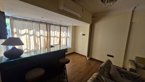 Living Room in 4 BHK Apartment at Woodstock Apartments, Versova – for Rent