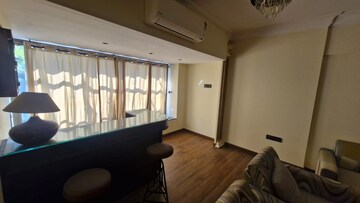 Living Room in 4 BHK Apartment at Woodstock Apartments, Versova – for Rent