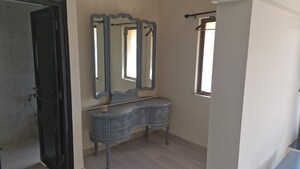 Bathroom in 4 BHK Apartment at Woodstock Apartments, Versova – for Rent