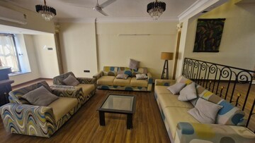 Living Room in 4 BHK Apartment at Woodstock Apartments, Versova – for Rent