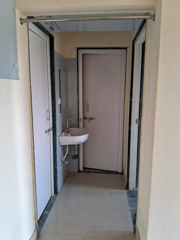 Building Lobby in 1 BHK Apartment at Sector 14 Dwarka – for Rent