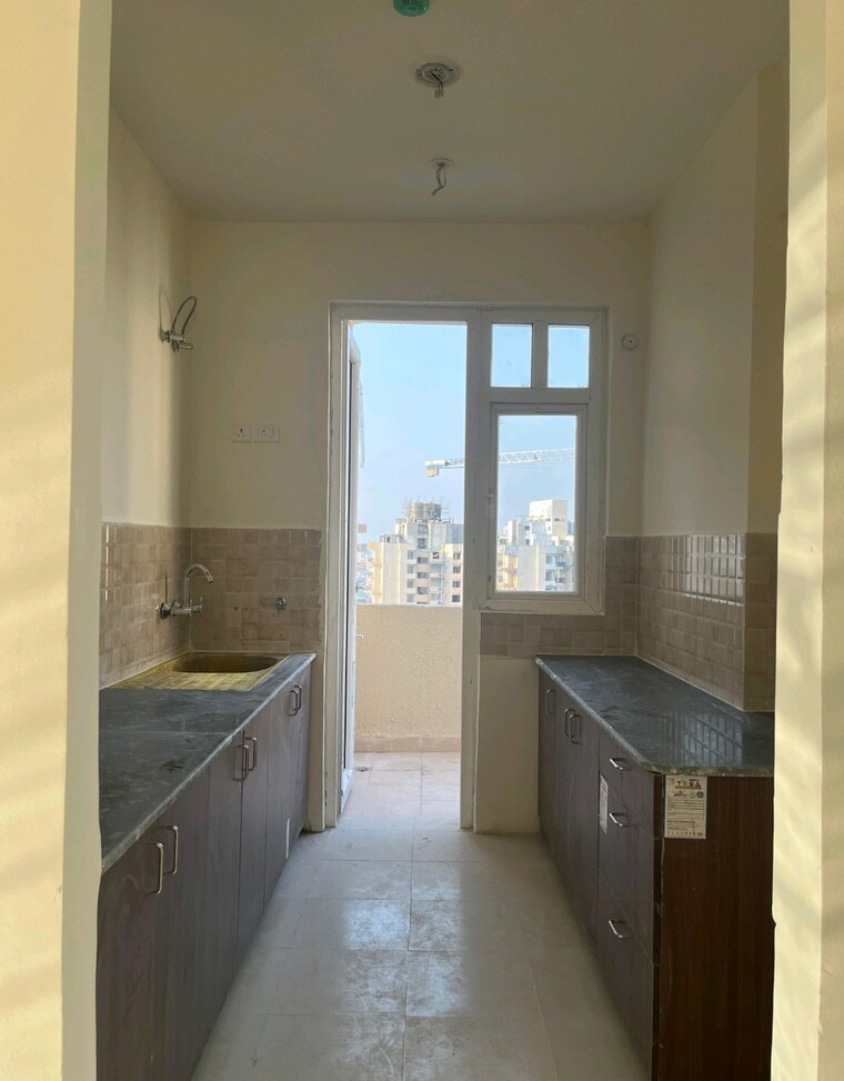 Kitchen, amrapali-heartbeat-city 3 Bedroom 1350 Sq.Ft. Apartment In Sector 107 Noida 9670576