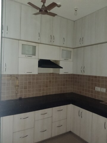 Kitchen in 2.5 BHK Apartment at Mahagun Mywoods, Sector 16c Greater Noida – for Rent