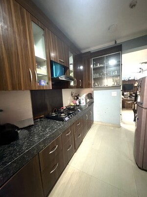 Kitchen in 3 BHK Apartment at Paramount Floraville, Sector 137 – for Rent