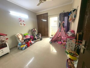 Living Room in 3 BHK Apartment at Paramount Floraville, Sector 137 – for Rent