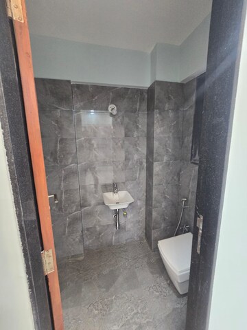 Bathroom in 2 BHK Apartment at Pratham ARC Aura, Andheri West – for Rent