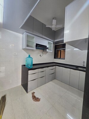 Kitchen in 2 BHK Apartment at Pratham ARC Aura, Andheri West – for Rent