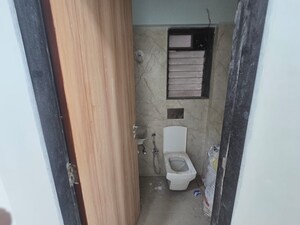 Bathroom in 2 BHK Apartment at Pratham ARC Aura, Andheri West – for Rent