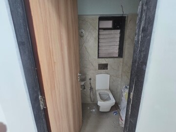 Bathroom in 2 BHK Apartment at Pratham ARC Aura, Andheri West – for Rent