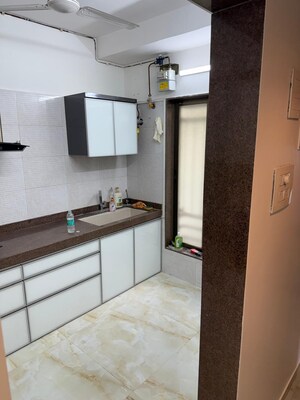 Kitchen in 2 BHK Apartment at JV Sweena, Andheri East – for Sale