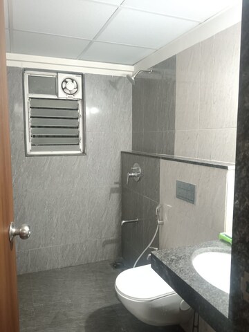 Bathroom in 2 BHK Apartment at Gera World of Joy, Kharadi – for Rent