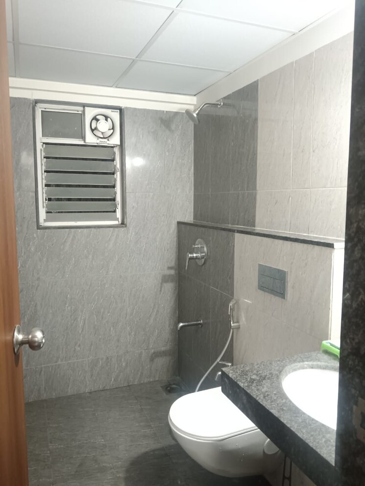 Bathroom, gera-world-of-joy 2 Bedroom 792 Sq.Ft. Apartment In Kharadi Pune 9671554
