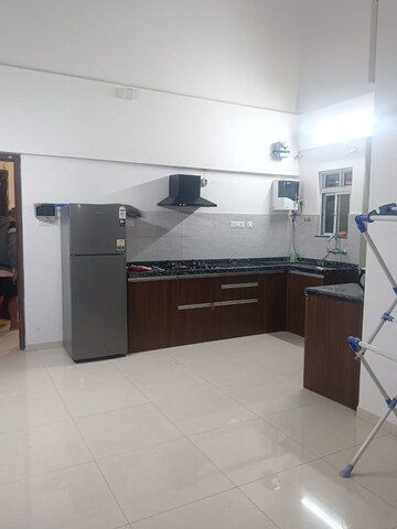Kitchen in 2 BHK Apartment at Gera World of Joy, Kharadi – for Rent