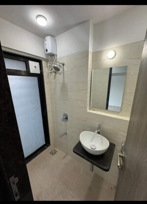 Bathroom in 1 BHK Apartment at Mangal Murti CHS Andheri, Andheri West – for Sale