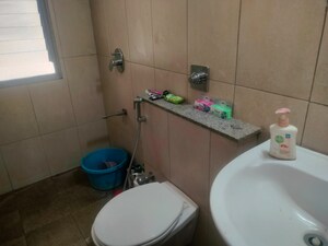 Bathroom in 2 BHK Apartment at Pride Manhattan, Charholi Budruk – for Sale