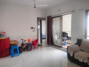 Living Room in 2 BHK Apartment at Pride Manhattan, Charholi Budruk – for Sale
