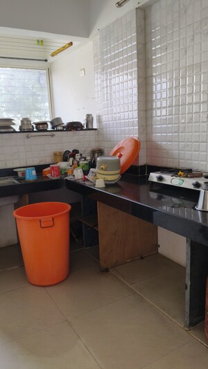 Kitchen in 2 BHK Apartment at Highland Anandvan, Baner – for Rent