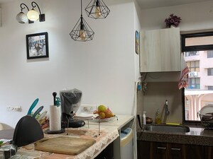 Living Room in 1 BHK Apartment at Kanakia Rainforest, Andheri East – for Rent