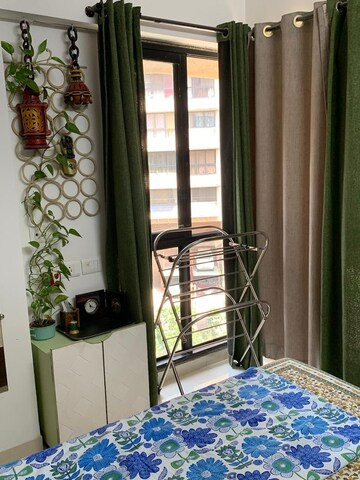 Living Room in 1 BHK Apartment at Kanakia Rainforest, Andheri East – for Rent