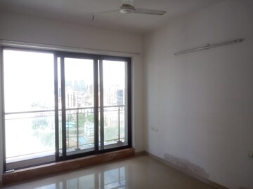 Room in 2 BHK Apartment at Rustomjee Elanza, Malad West – for Rent