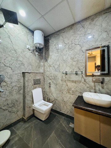 Bathroom in 4 BHK Apartment at Sangwan Heights, Raj Nagar Extension – for Sale