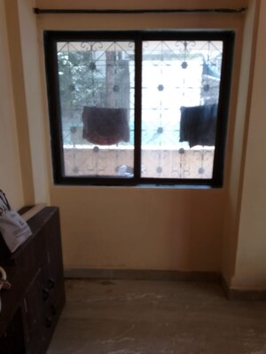 Living Room in 1 BHK Apartment at Dombivli West – for Sale
