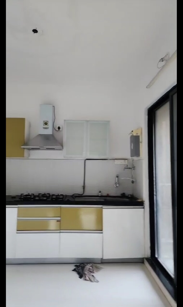 Kitchen, pride-world-city-brooklyn 2 Bedroom 672 Sq.Ft. Apartment In Charholi Budruk Pune 9672650