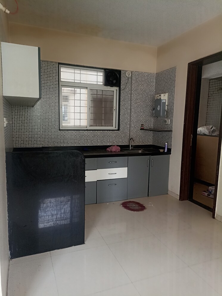 Kitchen, fortune-associates-aristolia 2 Bedroom 1019 Sq.Ft. Apartment In Hadapsar Pune 9672798