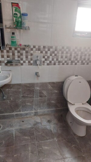 Bathroom in 2 BHK Apartment at Charms Castle, Raj Nagar Extension – for Rent