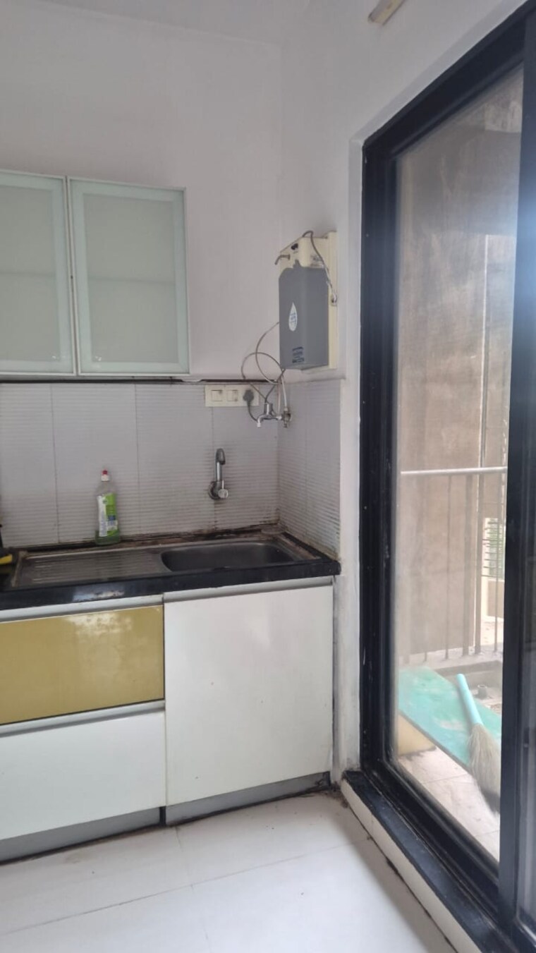 Kitchen, pride-world-city-brooklyn 2 Bedroom 672 Sq.Ft. Apartment In Charholi Budruk Pune 9672818