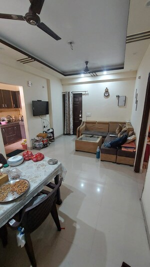 Living Room in 2 BHK Apartment at Charms Castle, Raj Nagar Extension – for Rent